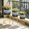 A set of three large, medium and small golden textured iron flower POTS with high legs Application Scenario